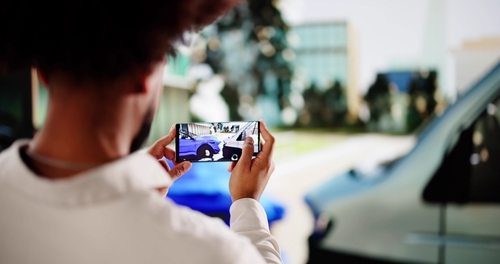 Aurora IL Insurance Adjuster Photographing Multi-Vehicle Crash Damage aurora il insurance adjuster photographing multi vehicle crash damage