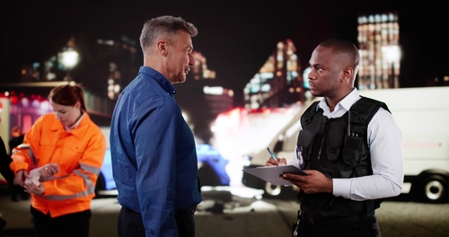 Fort Lauderdale Car Accident Passenger Filing Claim With Officer