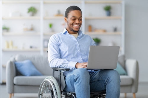 Memphis Catastrophic Injury Victim in Wheelchair Using Laptop
