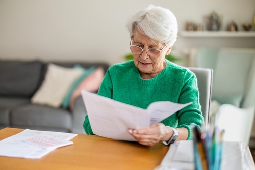 Houston Grandmother Reviewing Grandparent Custody Rights Documents