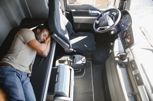 Sleep-Deprived Semi-Truck Driver Sleeping in Cabin Utah