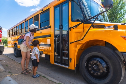 Mother and Child Boarding Philadelphia School Bus