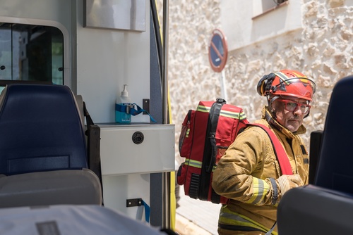 Mansfield Ohio Emergency Responder Standing By Medical Transport Vehicle