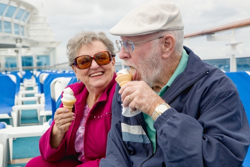 Happy Senior Couple Enjoying Miami Cruise Ship Deck Is a Cruise Line Liable for Shore Excursion Injuries in Florida?