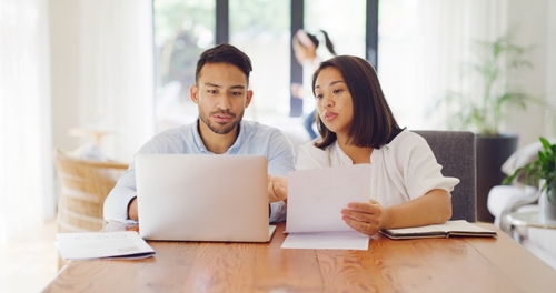 Texas Couple Reviewing Prenuptial Agreement Documents Together