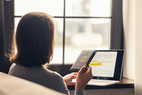 San Diego Woman Filling K-1 Visa Application With Passport