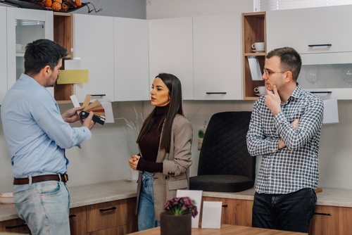 Chicago Couple Consulting Kitchen Designer with Material Samples