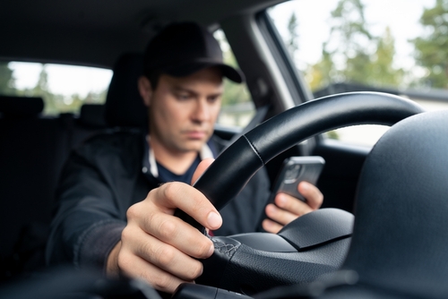 Distracted Driver Texting on Sacramento Highway 99