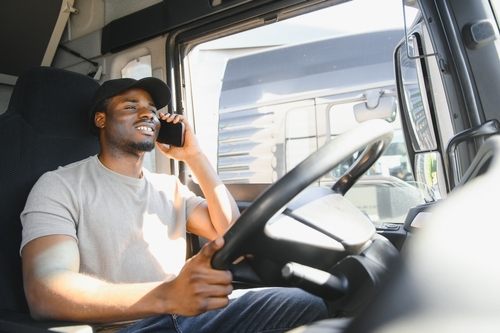 cumming truck driver distracted on phone while driving