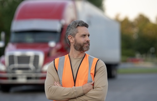 Denver Truck Driver Standing Near Semi Truck