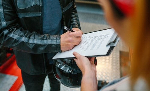 Illinois Motorcyclist Signing Accident Lawsuit Legal Documents illinois motorcyclist signing accident lawsuit legal documents