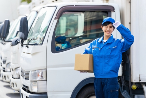 Amazon Delivery Driver Holding Package Near Truck Philadelphia