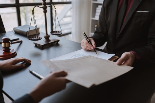 Lawyer speaking with his client