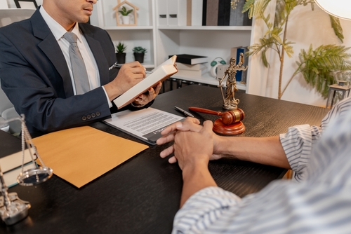 San Antonio Wrongful Death Attorney Reviewing Evidence With Client