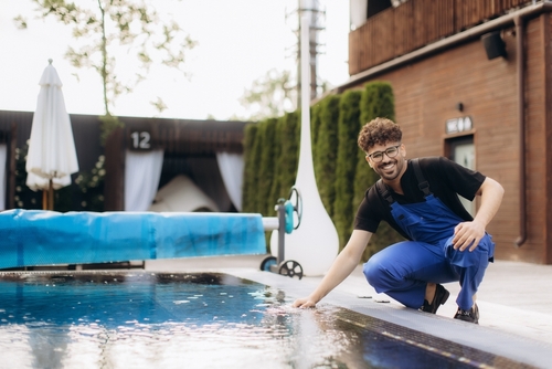 Las Vegas Hotel Pool Maintenance Worker Checking Water