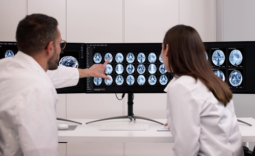 Doctor Reviewing Brain Radiology Scan for TBI Case Jackson Mississippi