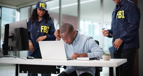 FBI Officers Arresting Man in Chicago Federal Case