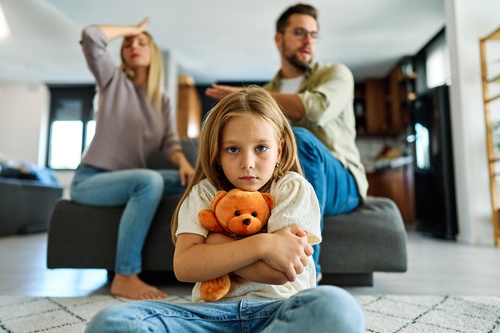 Sad Child Caught Between Parents Dispute Austin Custody Case