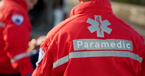 Paramedic jacket with medical star symbol and reflective Paramedic text on back