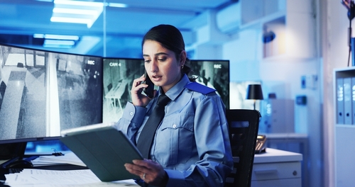 Hollywood Florida Hotel Security Guard On Phone Hollywood Florida Hotel Security Guard On Phone